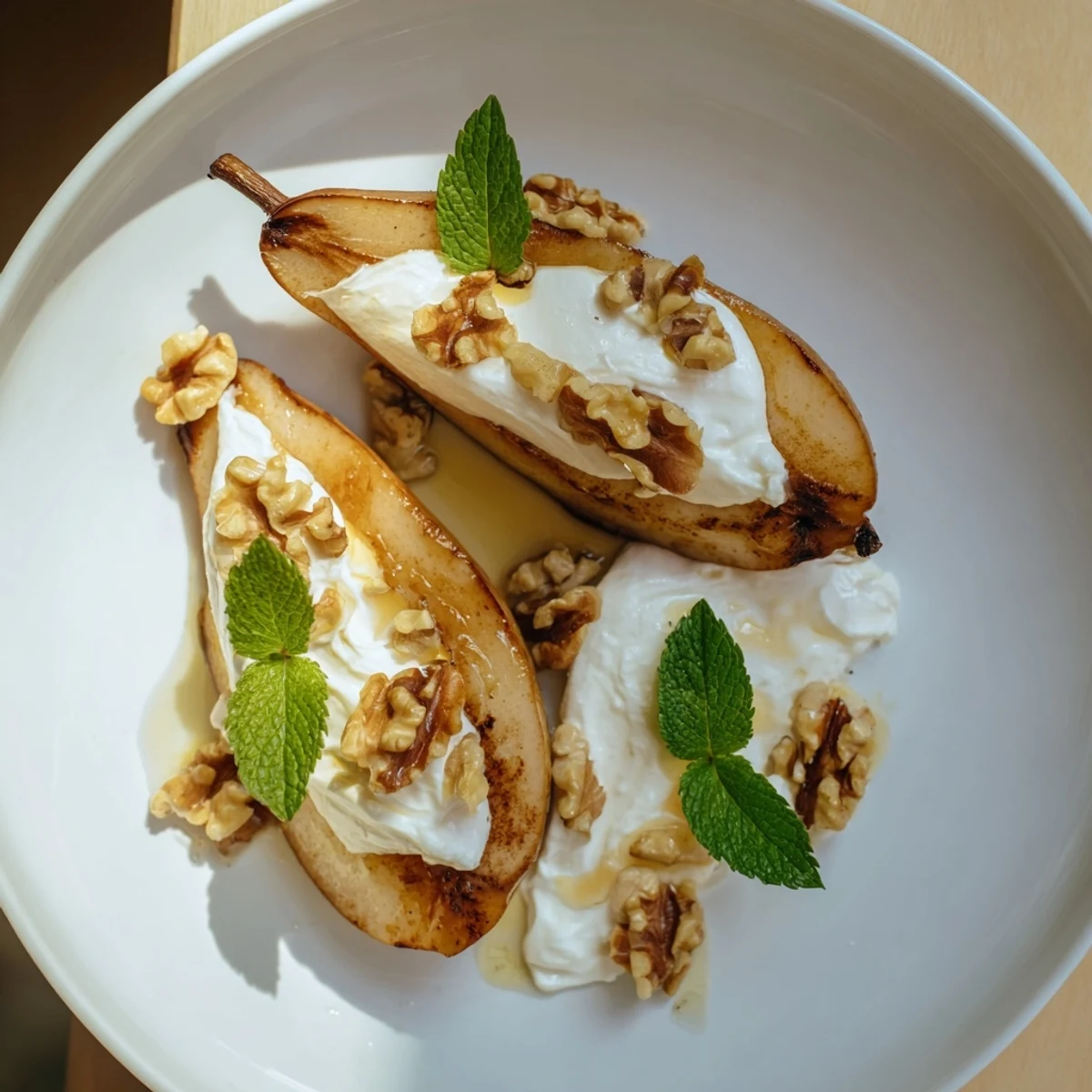 A close-up of roasted pears with cinnamon, walnuts, and Greek yogurt—a flavorful, healthy dish.