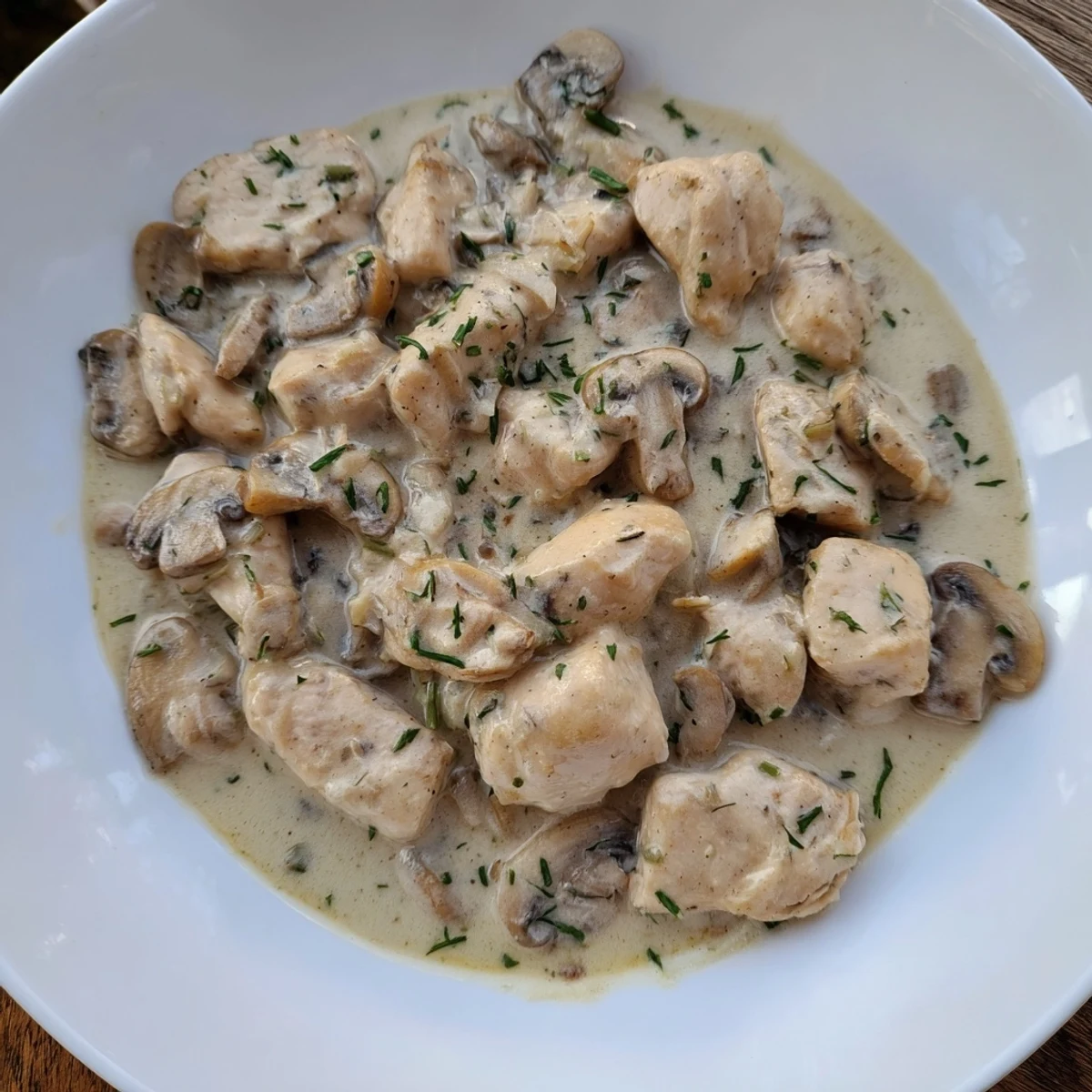 Delicious, tender Tarragon Chicken & Mushroom Skillet, featuring perfectly cooked mushrooms, rich sauce, and fresh tarragon.