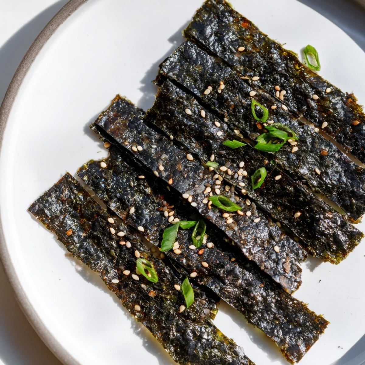 Golden, crunchy stacks of "Snacks de Vague Surf" ready to eat, a flavorful treat, slightly salty.