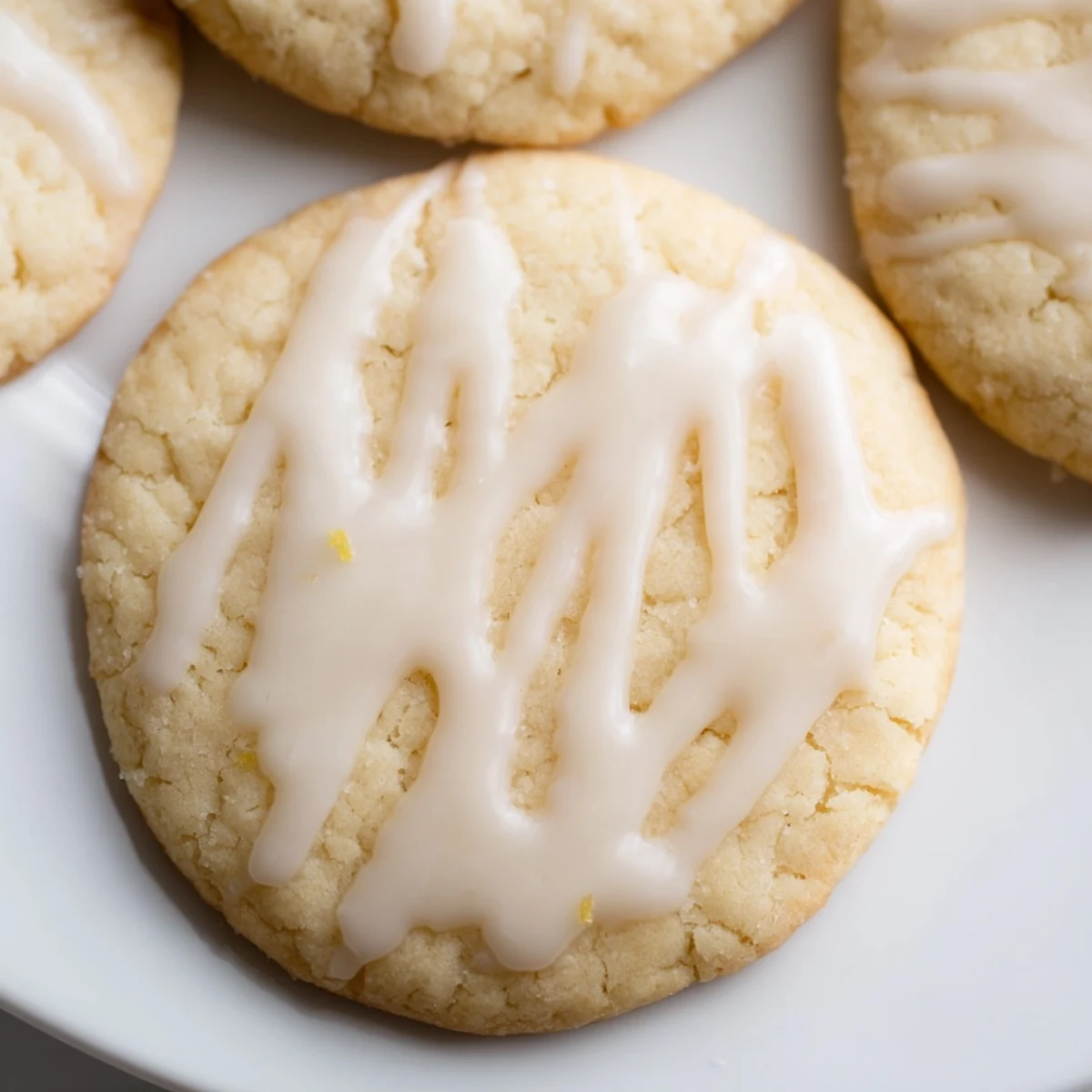 Golden, freshly baked Holiday Cookies with Icing Drizzle, perfect for sharing during festive celebrations.
