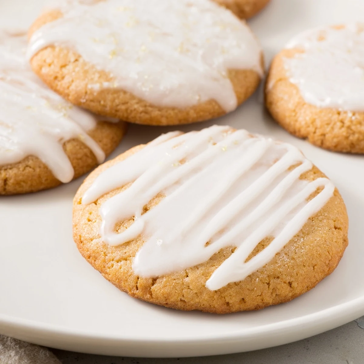 Buttery Holiday Cookies with Icing Drizzle, featuring a sweet, flowing glaze, ready to enjoy this season.