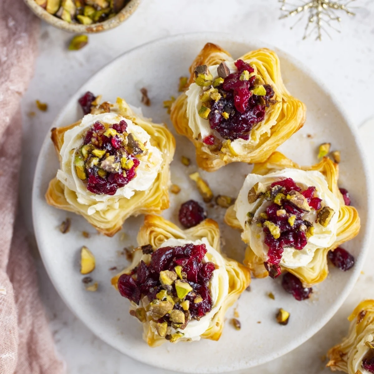 Golden, flaky Cranberry Christmas Star: a stunning holiday appetizer, featuring sweet, tart cranberries.