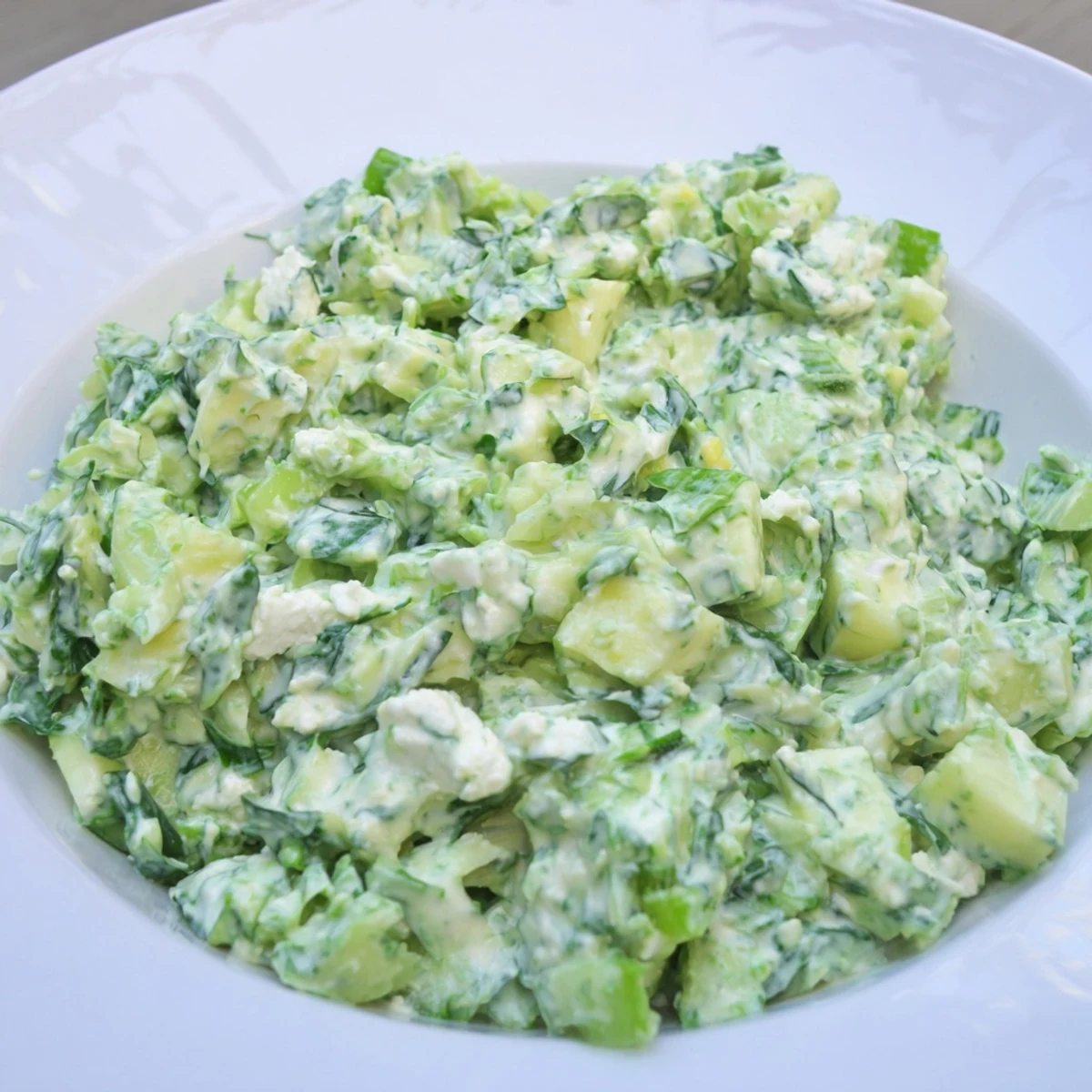 Close up view of the refreshing Green Goddess Cabbage Dip, creamy and loaded with fresh greens.