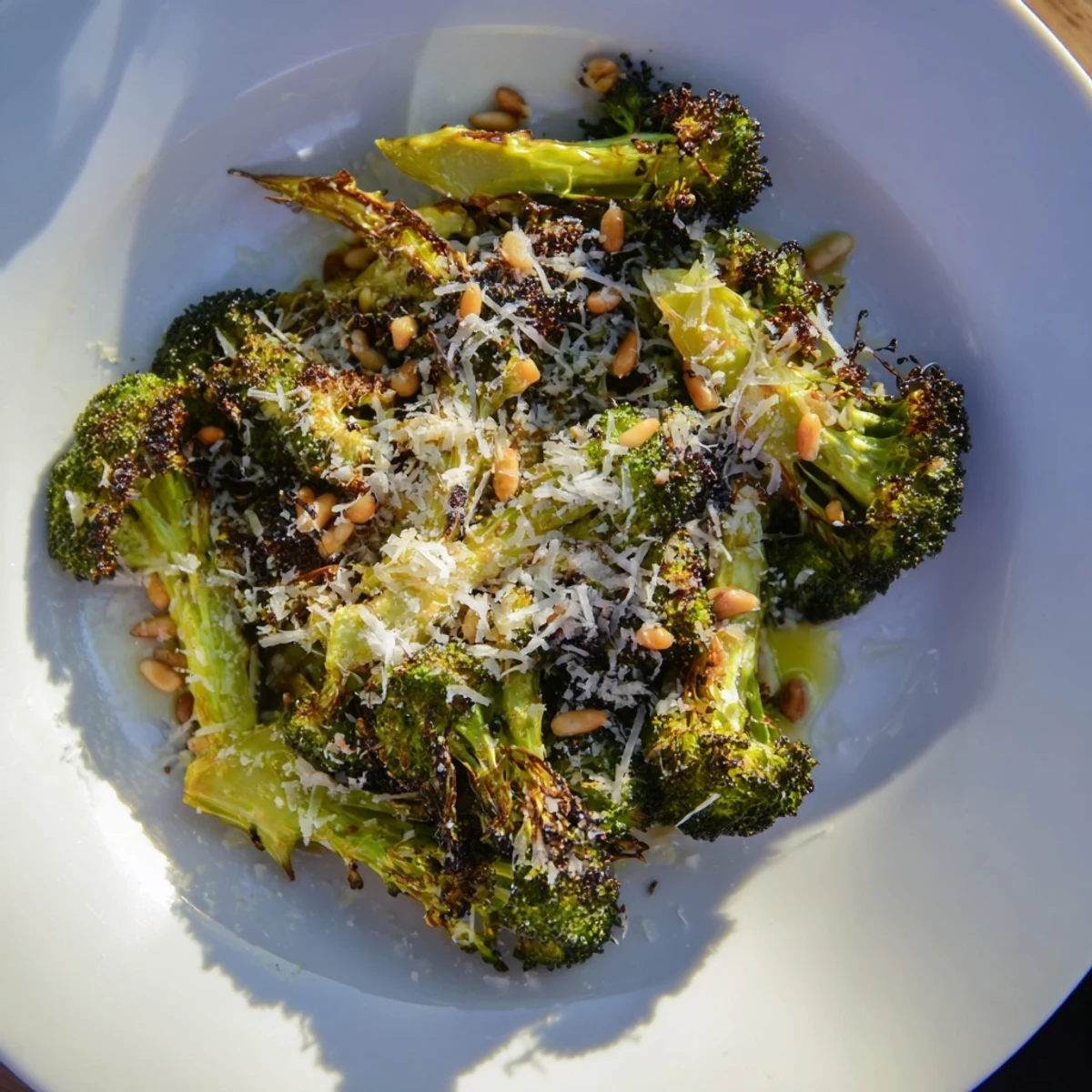 Roasted broccoli for a flavorful Charred Broccoli Salad with red onion, a delightful vegetarian dish.