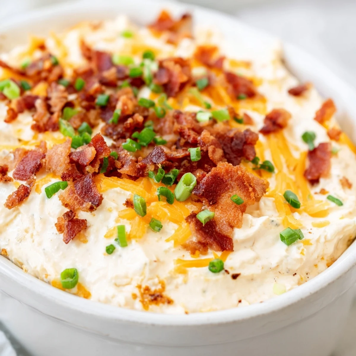 Golden, bubbly Cheesy Bacon Ranch Dip, a crowd-pleasing appetizer brimming with bacon and cheddar.
