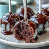 Pot of Gold Cake Pops: festive St. Patrick's Day treats with chocolate coating and shimmering gold sprinkle coins.