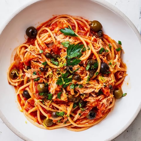 Pasta with Tuna, Olives & Capers: A close-up shot of the finished pasta, bursting with flavor and color.