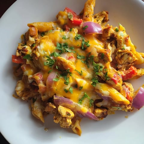 Golden, bubbly baked Salsa Chicken Pasta, perfect for a flavorful family dinner served hot.