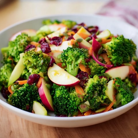 Fresh Broccoli and Apple Hot Girl Salad, featuring vibrant green broccoli florets and apple slices.
