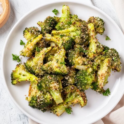Golden and crispy Garlic Parmesan Roasted Broccoli, ready to serve as a flavorful side dish.