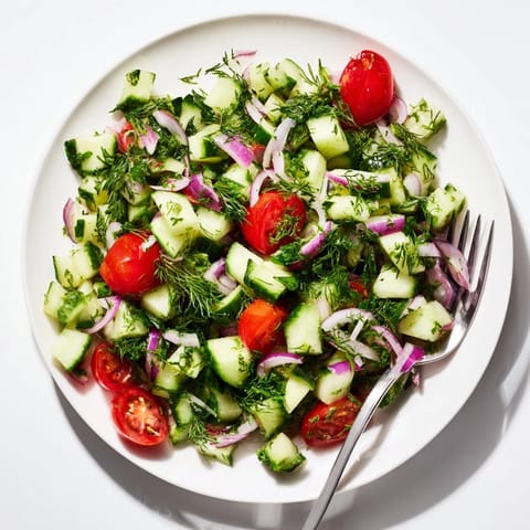 Bright, colorful Simple Cucumber and Dill Chopped Salad, showcasing fresh cucumber chunks and vibrant herbs.