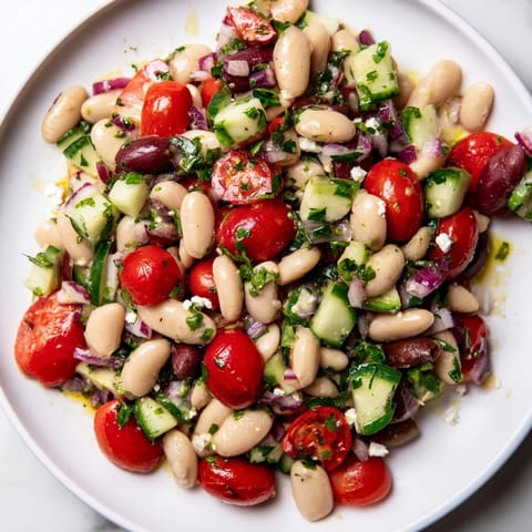 This healthy white bean salad offers a refreshing Mediterranean taste, perfect for a light lunch.