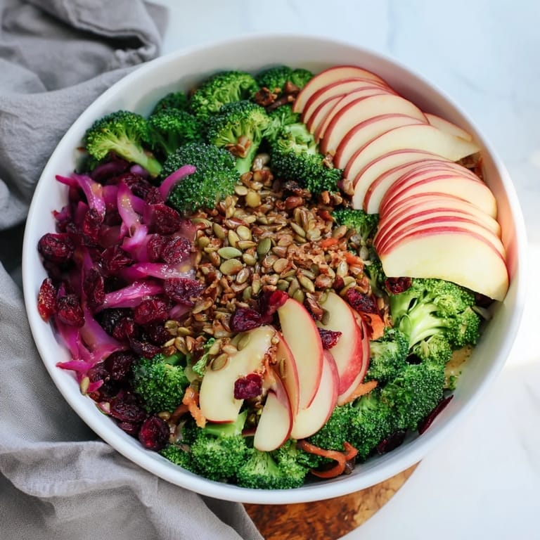 A colorful bowl of Broccoli and Apple Hot Girl Salad, perfect for a quick, healthy, refreshing lunch.