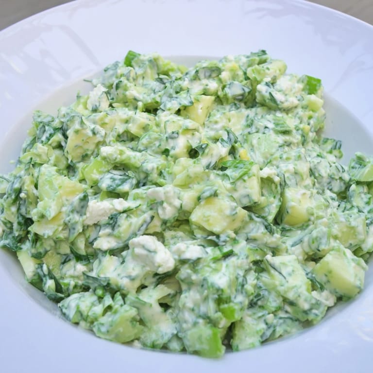 Close up view of the refreshing Green Goddess Cabbage Dip, creamy and loaded with fresh greens.